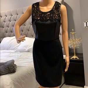 Black lace and leather dress